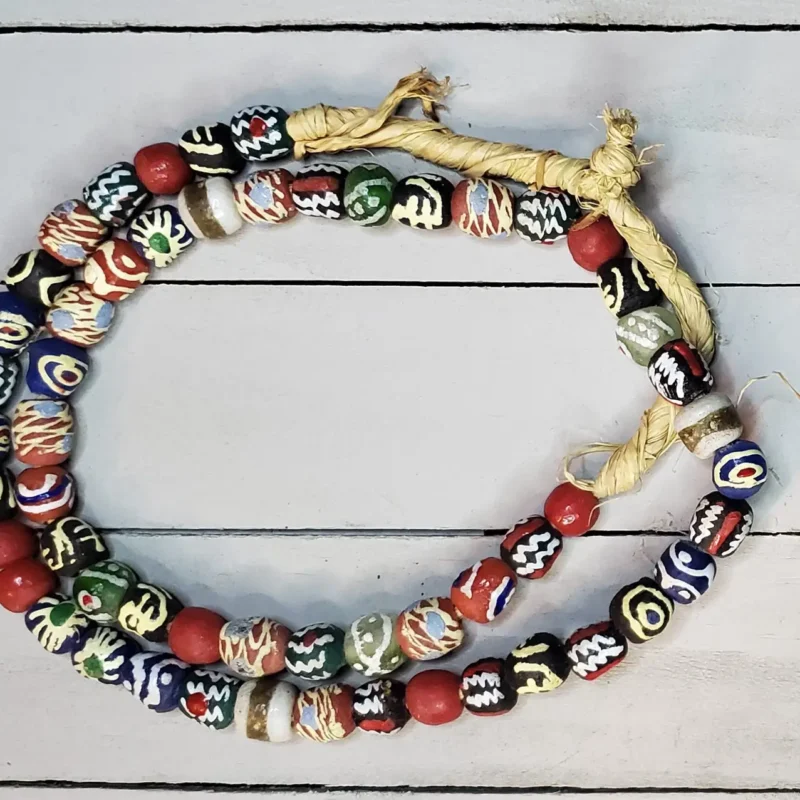 Rounded Krobo glass beads, hand-painted recycled glass from Ghana