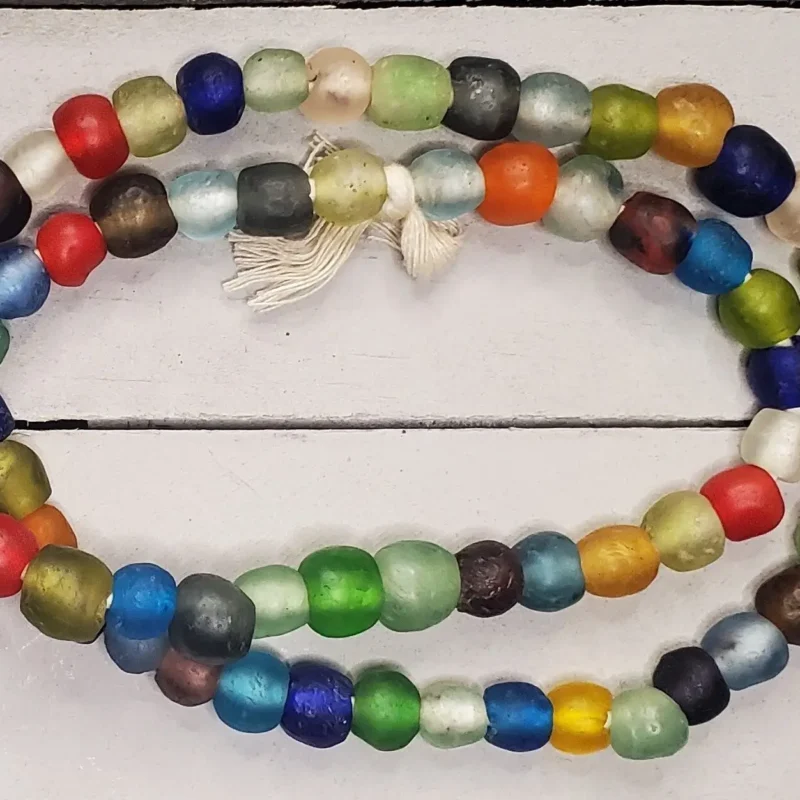 Small recycled glass beads from Ghana, hand-crafted by Krobo bead-makers