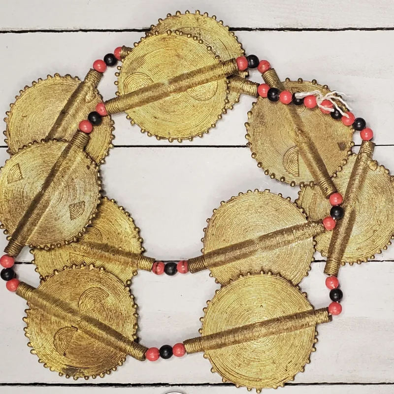Circular Ghanaian brass beads, hand-cast disc-shaped for jewelry-making