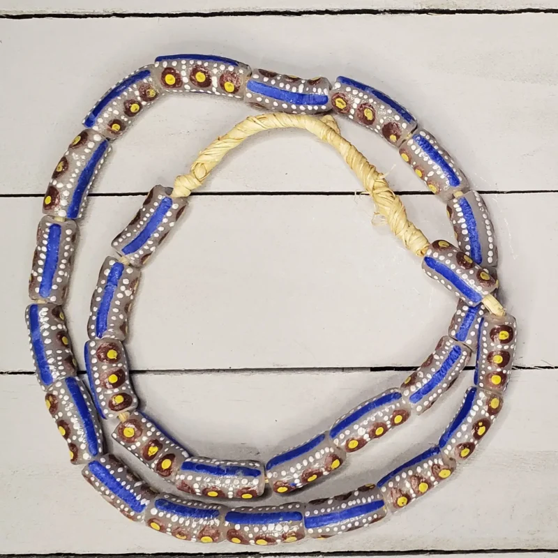 Krobo glass beads in red and blue, hand-painted recycled glass from Ghana