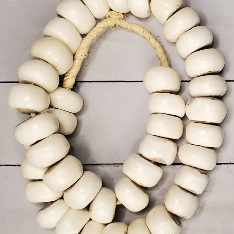 Kenyan cow bone beads, naturally-bleached and hand-shaped for jewelry