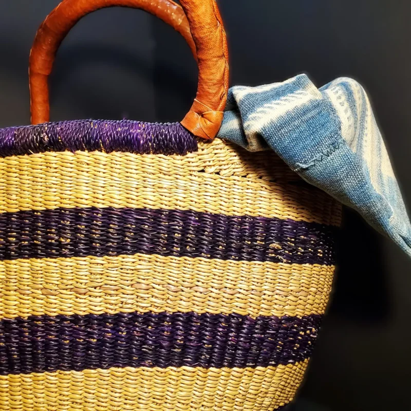 Butterfly-shaped Bolga basket from northern Ghana, hand-woven elephant grass with leather-wrapped handle