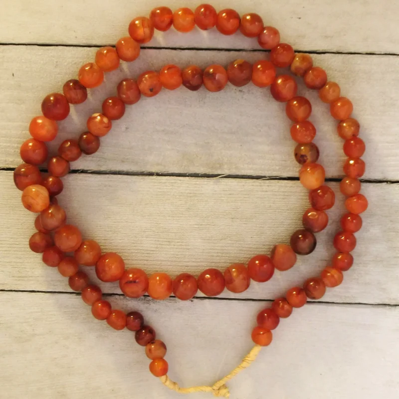 Round Nigerian agate beads, naturally-banded stones polished for jewelry